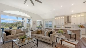 Grand entryway with a stylish console table, statement mirror, and carefully curated decor for a welcoming first impression.
